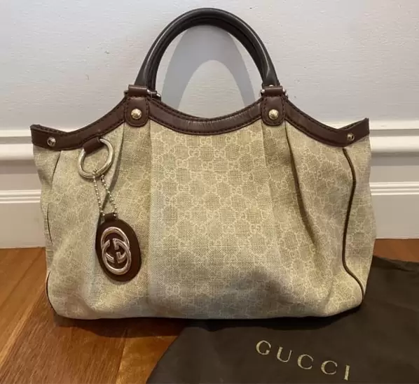 $650 Gucci gg timeless sukey cloth shoulder bag handbag