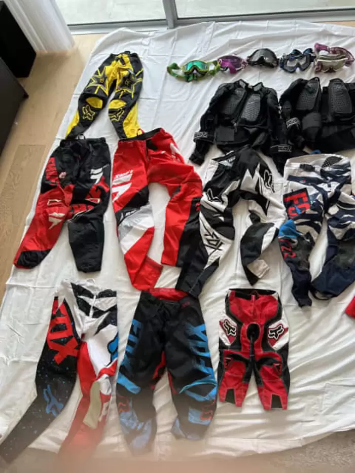 $1,500 Kids Motorbike Gear- various items and sizes. Sold in one lot only.